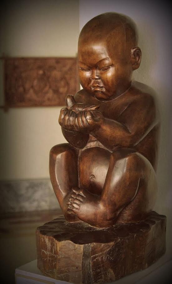 Оригинал "Мальчик с птичкой" из дерева.