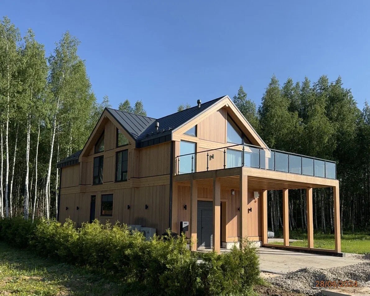 Загородный дом из вертикального бруса NATURI по проекту "Сван"