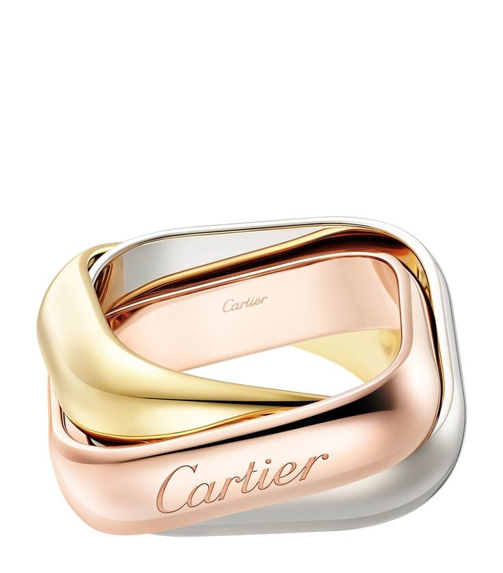 Кольцо Trinity от Cartier в трёх цветах золота в 750 пробе.