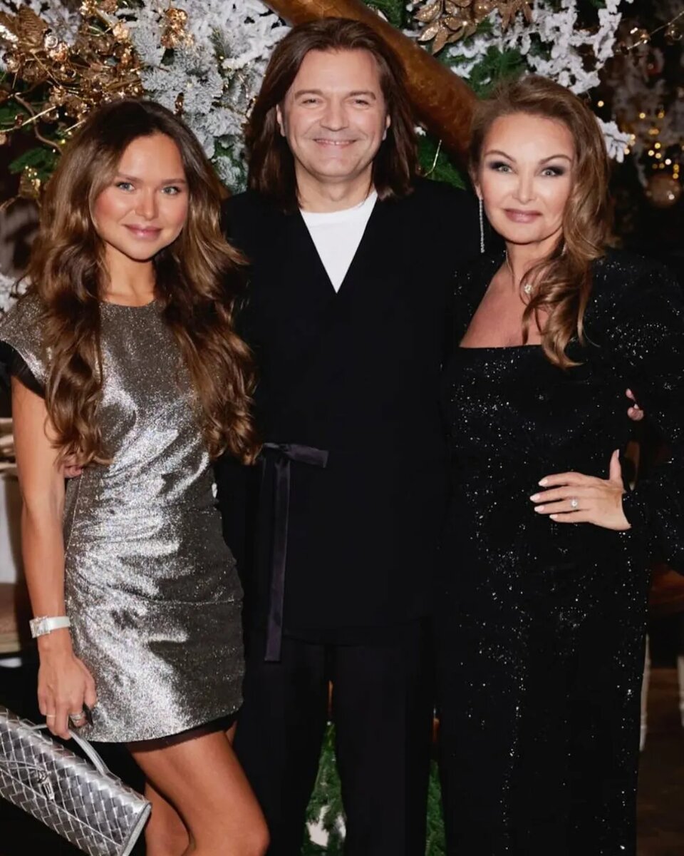 Дмитрий и Елена Маликовы с дочерью