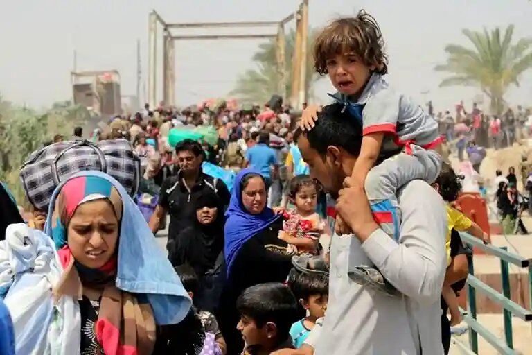    Афганские беженцы, август 2021 года. Фото Reuters