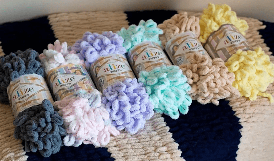 В линейку Ализе Пуффи входят однотонные или меланжевые нити