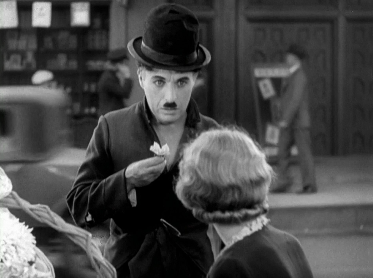 Кадр из фильма «Огни большого города»