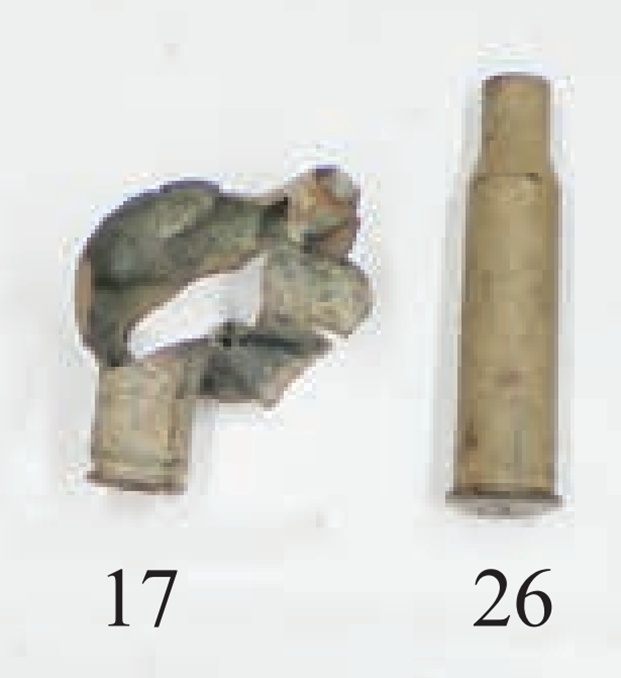 Рисунок 7.51. Якобы гильза от ТТ (поз. 17) рядом гильза от трехлинейки (поз. 26)[6]. Кстати, если патроном поз. 17 правда выстрелили в невинно осуждённого, то что стало с оружием и стрелком?
