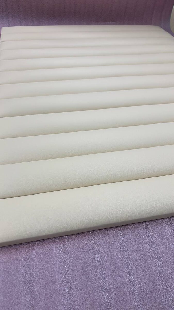 пример упаковки мягкого изголовья - подложка —> стрейчго —> фрокартон —> защитная пленка