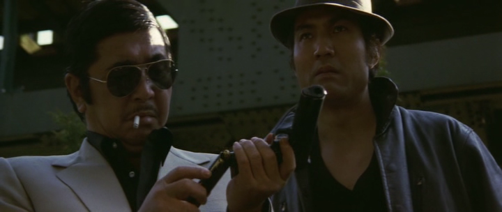 Кадр из фильма «Новые битвы без чести и жалости» (1974)