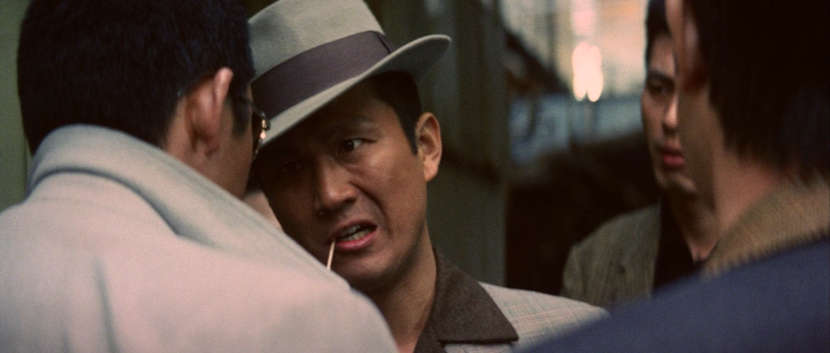 Кадр из фильма «Новые битвы без чести и жалости» (1974)