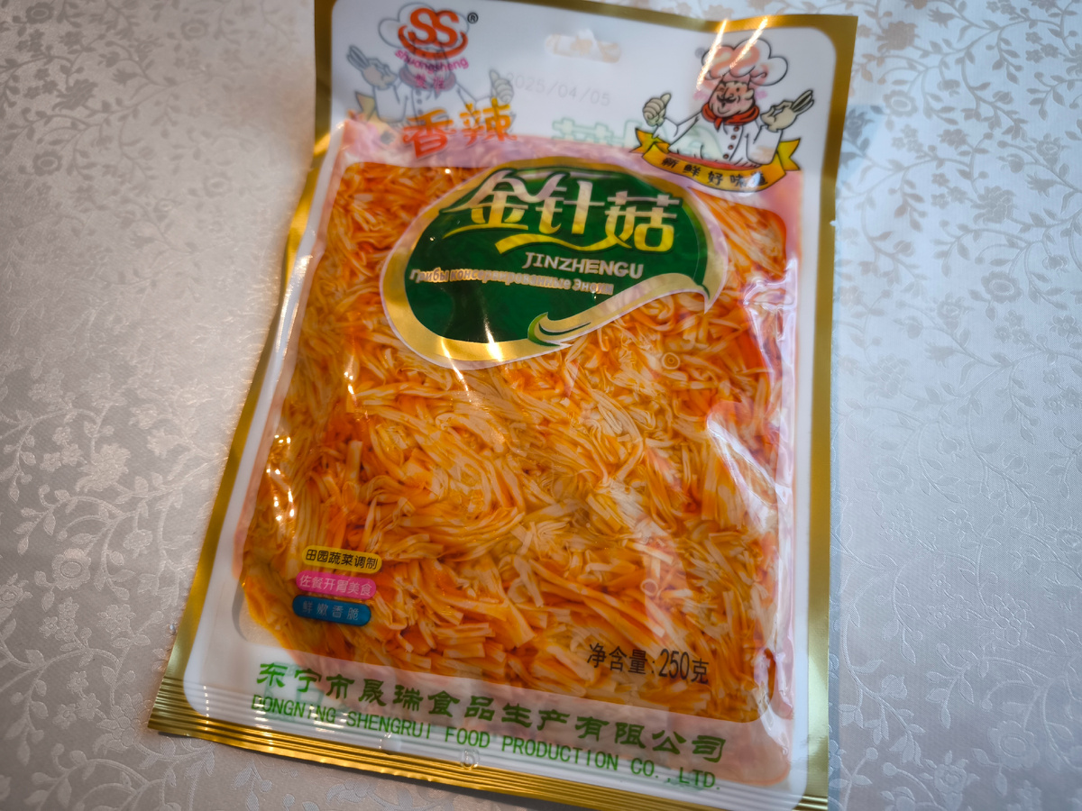 Грибы консервированные Эноки.