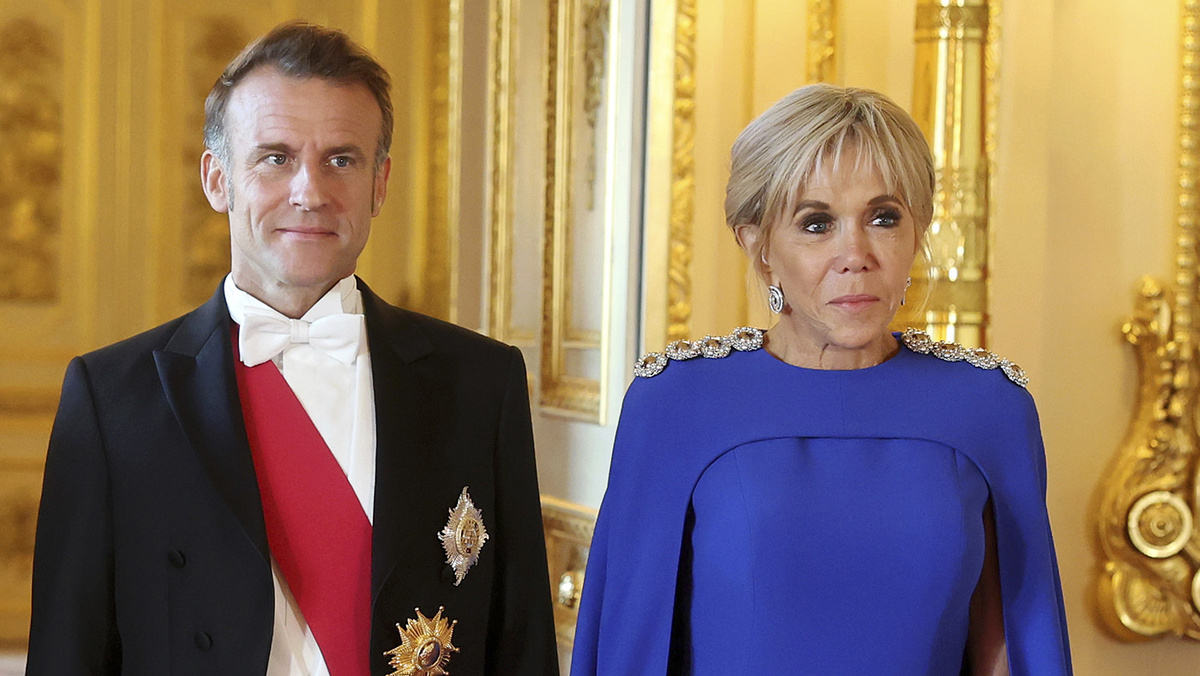   France's President Emmanuel Macron and wife Brigitte Macron attend the State Banquet at Windsor Castle, in Windsor, England, Tuesday, July 8, 2025. (Chris Jackson/Pool Photo via AP)- Chris Jackson / AP