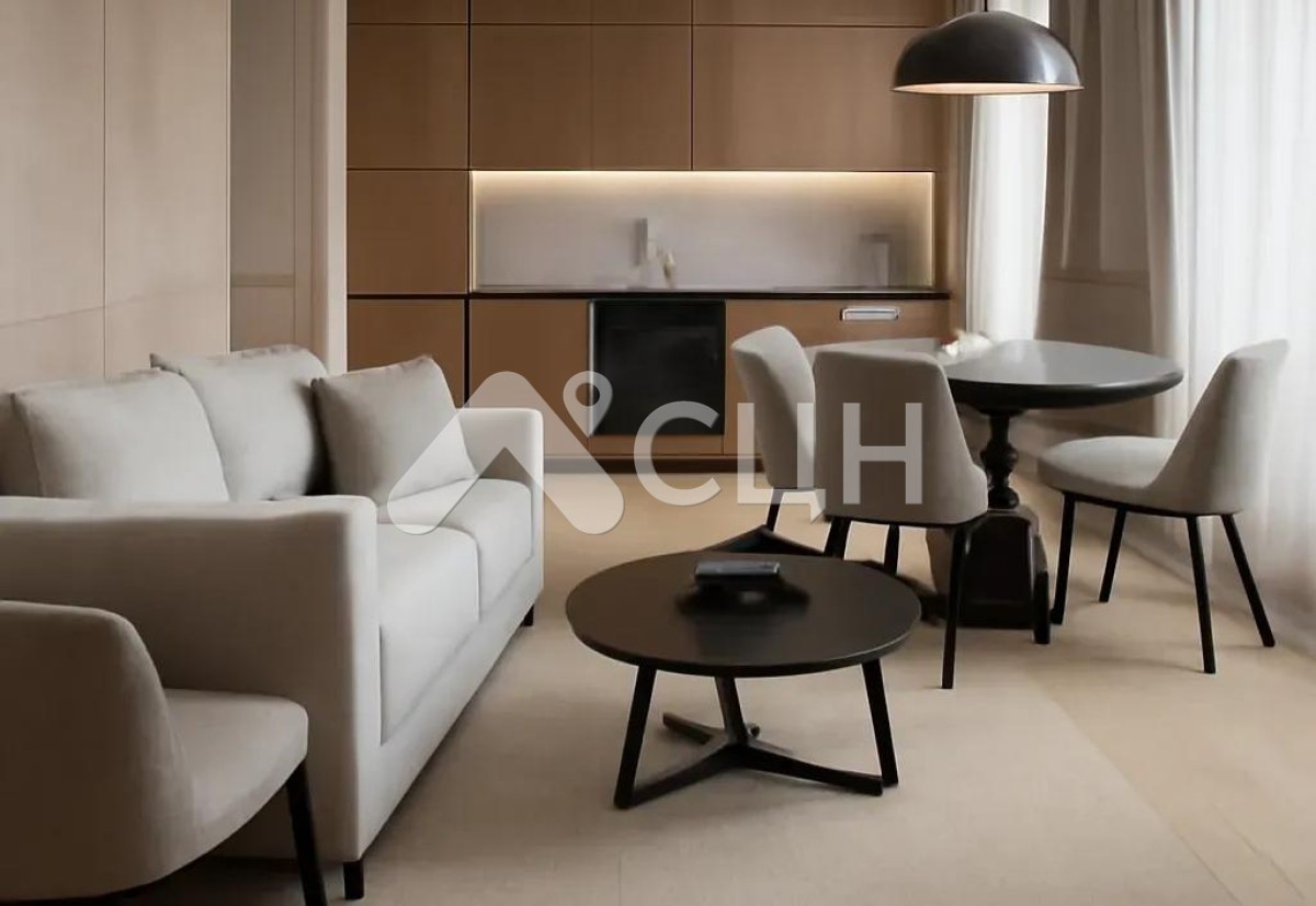 На фото изображены апартаменты с мебелью и дизайном в бежевых тонах