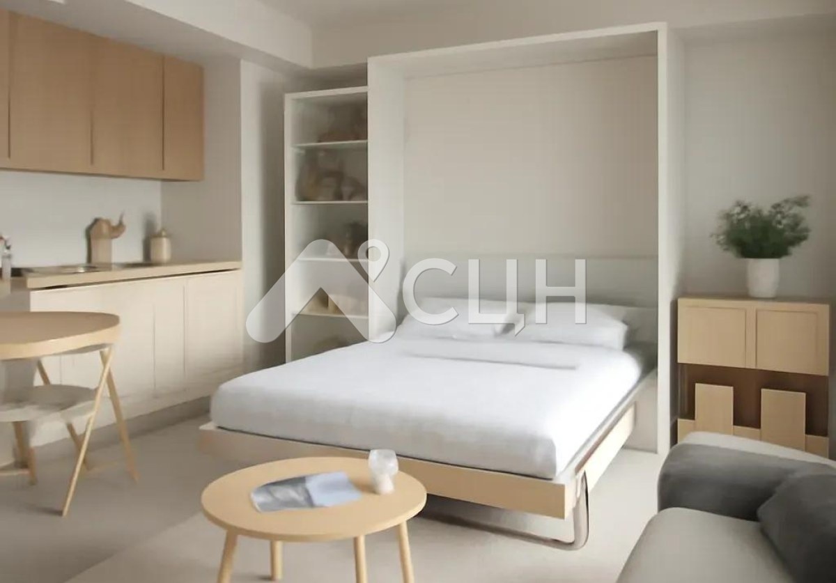 На фото квартира студия 25м2 с мебелью-трансформером