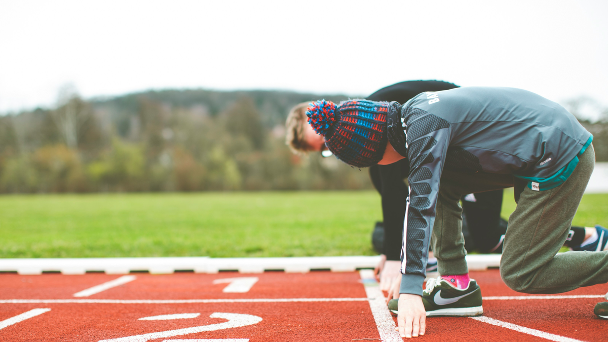 https://unsplash.com/photos/man-in-black-and-red-plaid-shirt-and-black-pants-standing-on-track-field-during-daytime-cSladFbk1bw