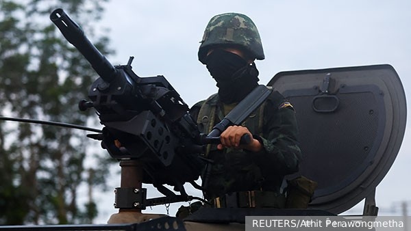     Фото: REUTERS/Athit Perawongmetha   
 Текст: Дмитрий Зубарев