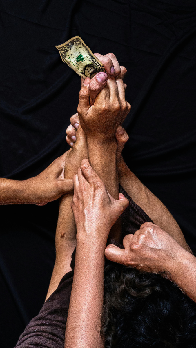Photo by Carlos Guevara: https://www.pexels.com/photo/symbolic-struggle-for-money-among-multiple-hands-32499274/
