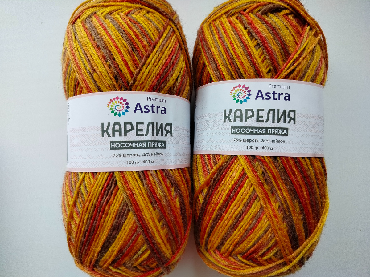 Выбрала для работы ниточку в осенних тонах и без четкого разделения цветовых полос. Вязать было просто и приятно.