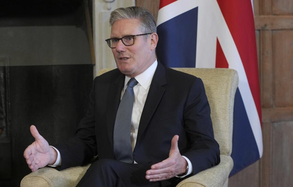 © AP Photo/Kin Cheung