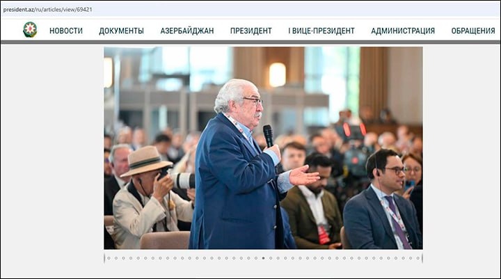 Профессиональный подхалим и ингриган Михаил Гусман в оккупированном армянском городе Нагорного Карабаха - Степанакерте задает вопросы Ильхаму Алиеву