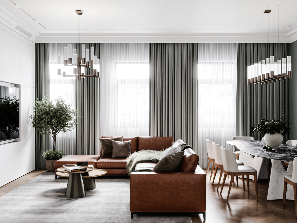 В этом пространстве удалось гармонично объединить сразу четыре функциональные зоны — кухню, столовую, диванную группу с ТВ и уютный уголок для чтения.