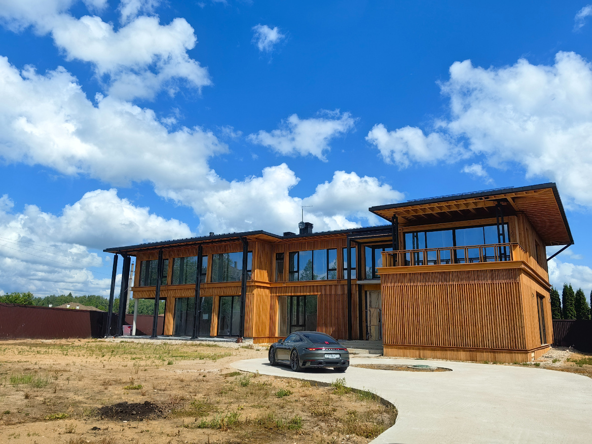 Двухэтажный загородный дом по проекту "Чигасово" компании NATURI