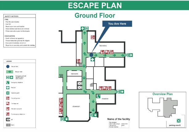 Вот так выглядит знак "Вы находитесь здесь" в международном стандарте ISO 23601:2009 "Safety identification — Escape and evacuation plan signs". Знак также хорош заметен.   
     Обратите внимание - в правом нижнем углу выполнена привязка данной части плана эвакуации к общему плану здания. 
     И еще - на плане эвакуации указано место сбора людей на прилегающей территории. Весьма удобно, на наш взгляд.