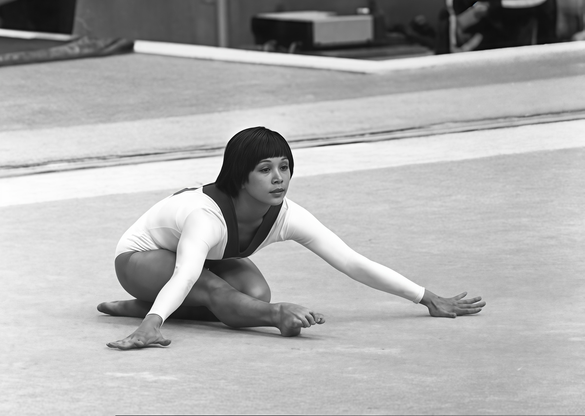 Трехкратная олимпийская чемпионка, абсолютная чемпионка мира по спортивной гимнастике Нелли Ким.