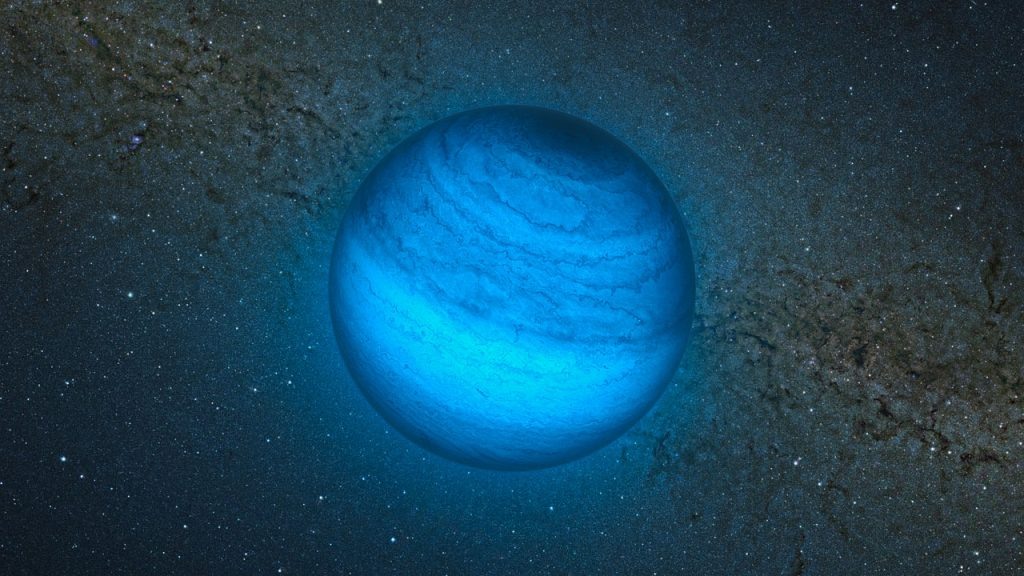    This artist’s impression shows the free-floating planet CFBDSIR J214947.2-040308.9. This is the closest such object to the Solar System. It does not orbit a star and hence does not shine by reflected light; the faint glow it emits can only be detected in infrared light. Here we see an artist’s impression of an infrared view of the object with an image of the central parts of the Milky Way from the VISTA infrared survey telescope in the background. The object appears blueish in this near-infrared view because much of the light at longer infrared wavelengths is absorbed by methane and other molecules in the planet's atmosphere. In visible light the object is so cool that it would only shine dimly with a deep red colour when seen close-up. Анастасия Никифорова
