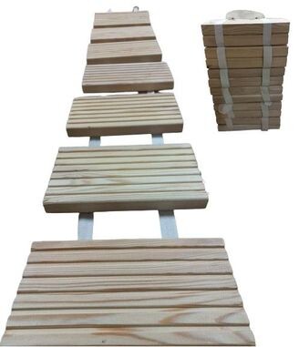 Дорожки садовые из лиственницы сибирской на полипропиленовой тесьме занимают мало места в сложенном виде, что удобно при хранении или транспортировке в другое место. Фото взято на сайте https://elitdrev.ru/