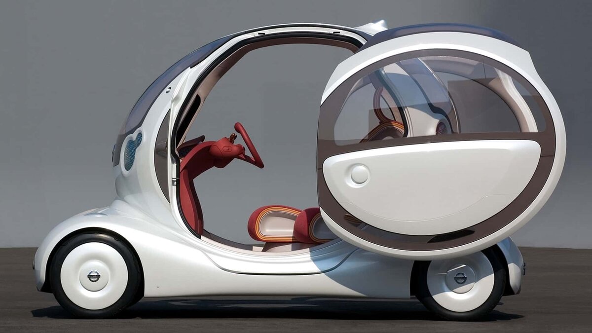 Двери в Nissan Pivo сдвижные, но без направляющих, как  обычно, а на хитроумных петлях