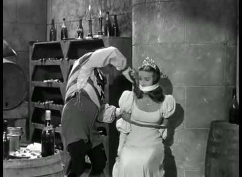 Кадр из фильма Fiddlers Three (1948), в роли принцессы Алисии - Вирджиния Хантер.