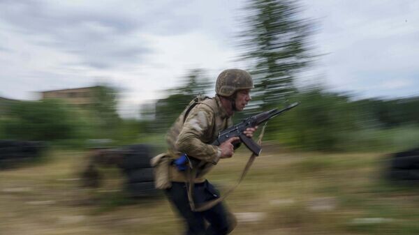    © AP / Evgeniy Maloletka