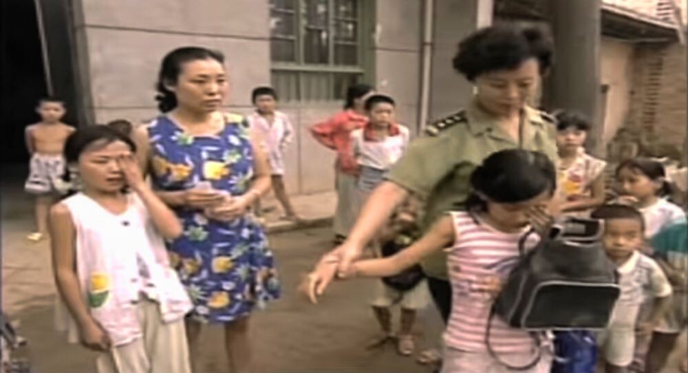 Чжань Шуицинь, которую сейчас называют "бабушкой Чжань" основала первую Солнечную деревню в 1995 году