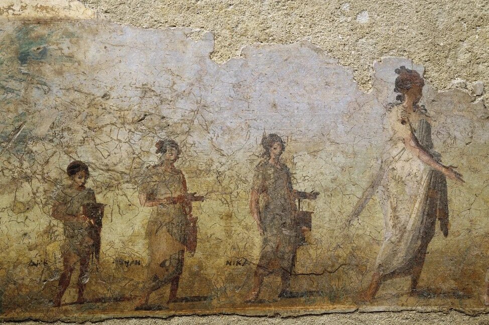На этой погребальной фреске 1-го века до н.э. из Порта Капена, Рим, изображены жена и дети в торжественной процессии. Такие сцены дают представление о римских погребальных обычаях и важности семьи в поминовении усопших. (Фото: Getty Images)