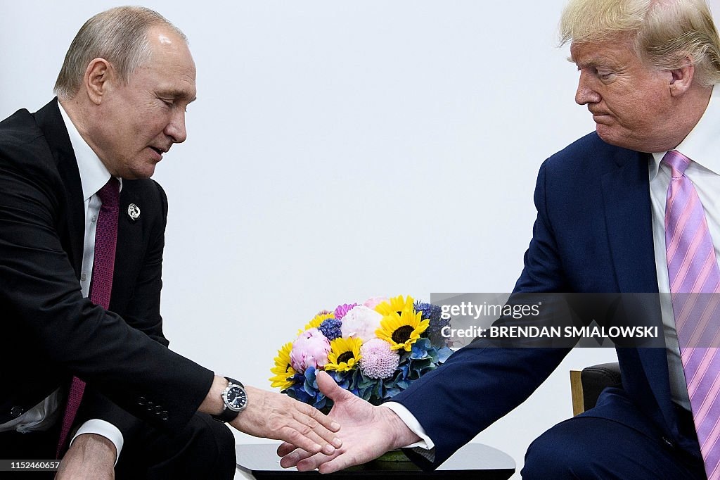 ЯПОНИЯ-САММИТ G20
Президент России Владимир Путин на встрече с президентом США Дональдом Трампом во время саммита G20 в Осаке 28 июня 2019 года. (Фото Брендана Смиаловски / AFP) (Фото БРЕНДАНА СМИАЛОВСКИ/AFP через Getty Images)