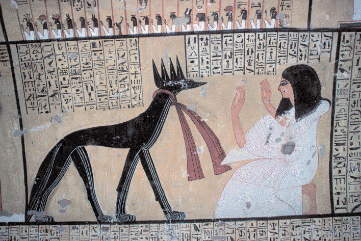 Анубис
В Древнем Египте времен фараонов черный цвет символизировал плодородие и плодородную почву. В погребальных обрядах он играл роль проводника, обеспечивая умершему переход в загробный мир. Это был цвет, несущий позитивный смысл, символ возрождения и новой жизни. Многие божества, связанные со смертью и загробным миром, изображались в черном цвете. Примером является Анубис, бог-шакал, занимавшийся бальзамированием и сопровождавший умерших в их последнее пристанище. 
Анубис. Живопись и иероглифы из интерьер гробницы Имперки. Фивы, XII век до н.э.