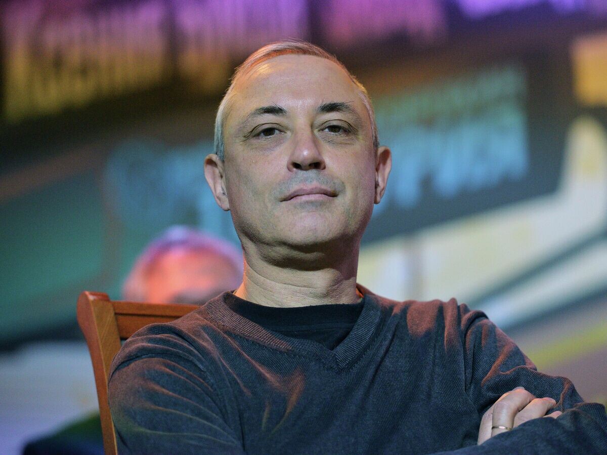    Писатель Евгений Чижов© РИА Новости / Владимир Песня