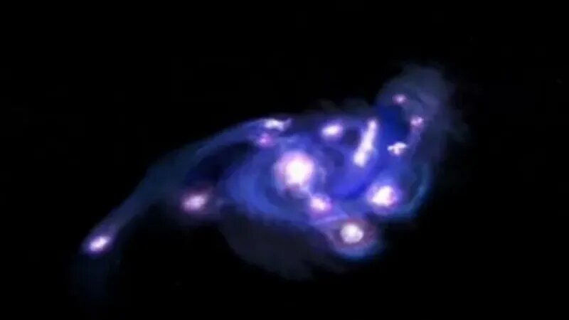 Художественное представление галактики «Космический виноград». Источник изображения: NSF/AUI/NSF NRAO/B.Saxton