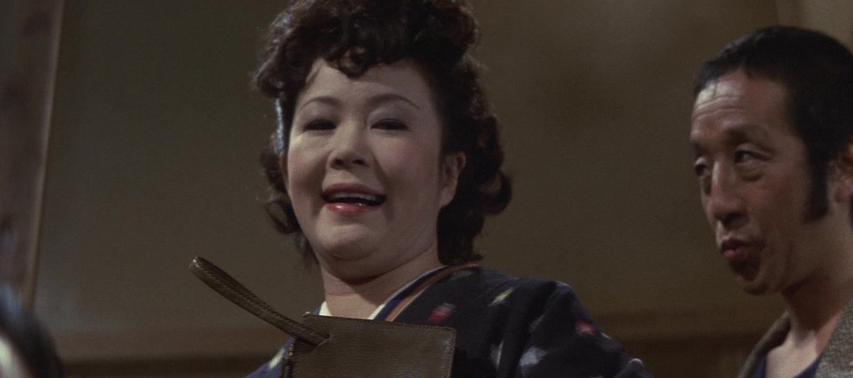 Кадр из фильма «Битвы без чести и жалости» (1973)