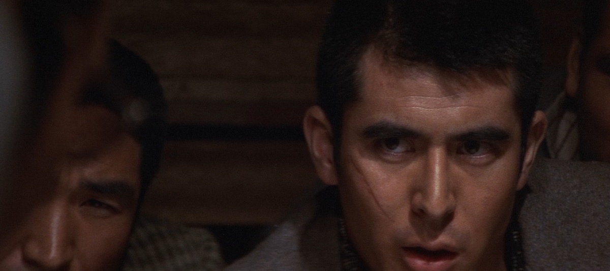 Кадр из фильма «Битвы без чести и жалости» (1973)