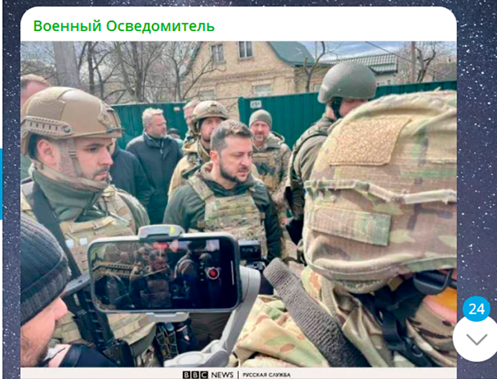    Обслуживая желание британского премьера "продолжать воевать", Зеленский поехал пиариться над ещё не остывшими телами, хотя мог закончить войну. Скриншот: ТГ-канал "Военный Осведомитель"