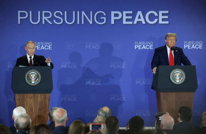   Владимир Путин и Дональд Трамп.Reuters
