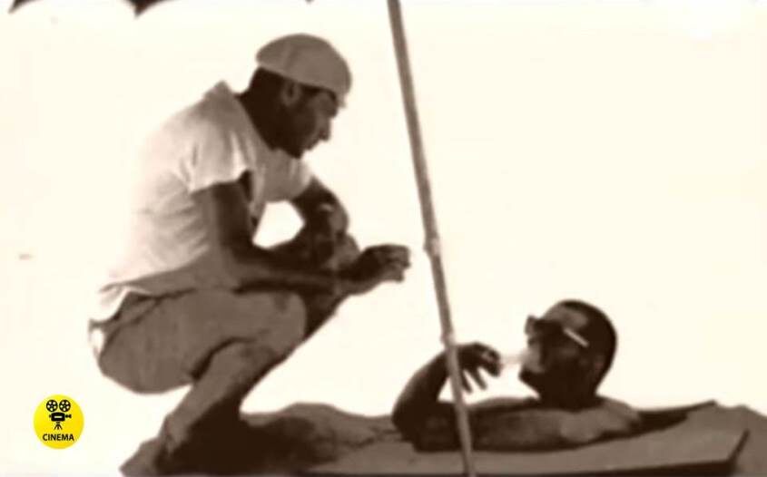 Владимир Мотыль (слева) обсуждает с помощником будущую сцену. На снимке можно заметить лежащую рядом крышку ящика.