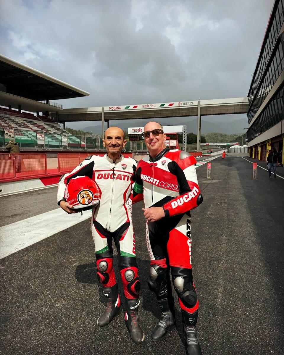 Любезно предоставлено компанией DucatiThe CEO of Ducati, Claudio Domenicali (left), with the author in pit lane at the Mugello Circuit, north of Florence.