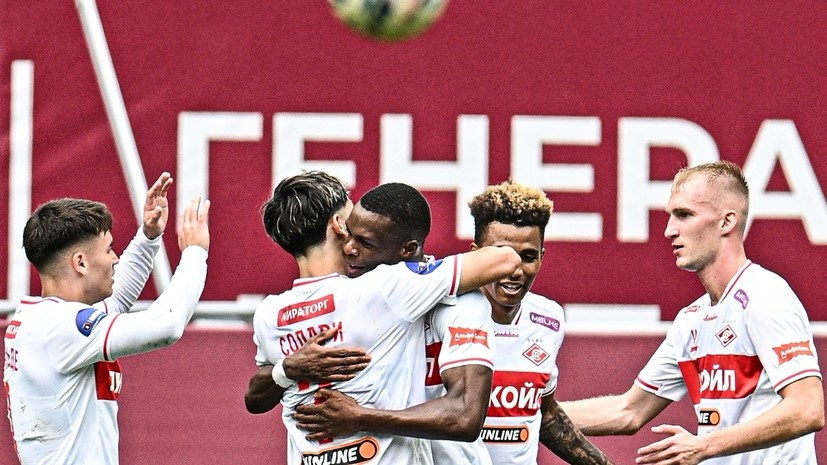     Футболисты «Спартака» в матче с «Рубином» РИА Новости Максим Богодвид