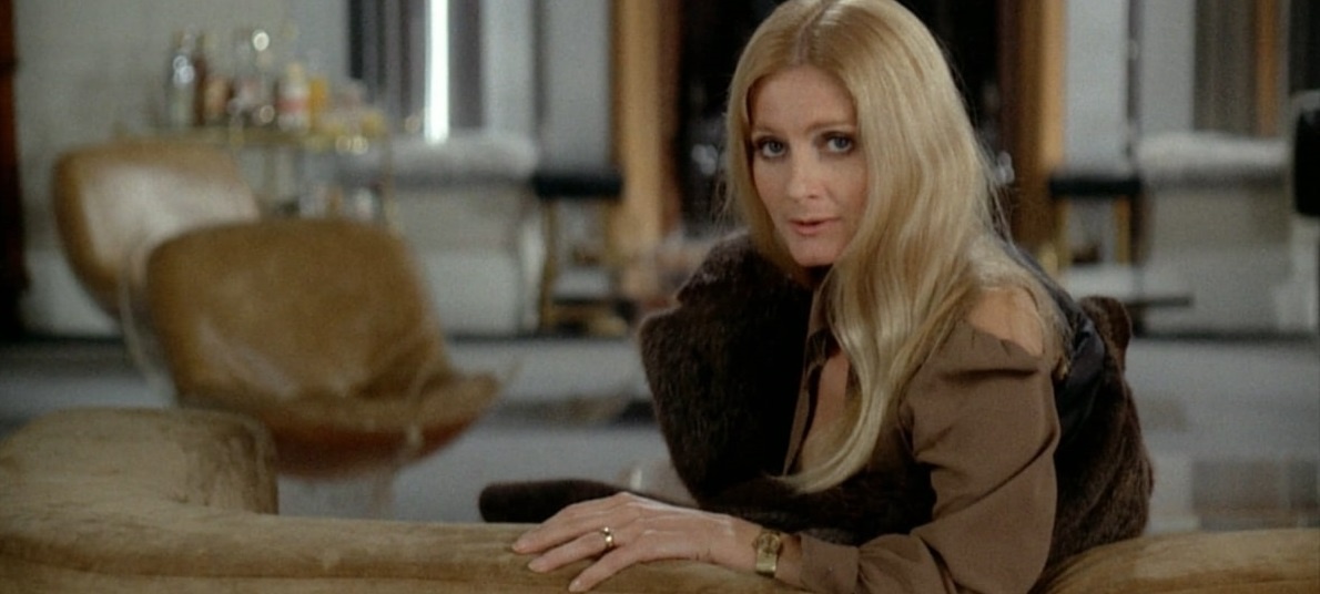 Кадр из фильма «Враг за дверью» (1971)