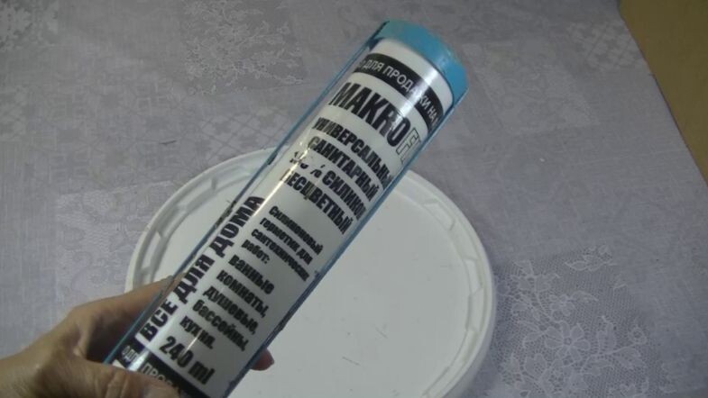 Силиконовый герметик безцветный .