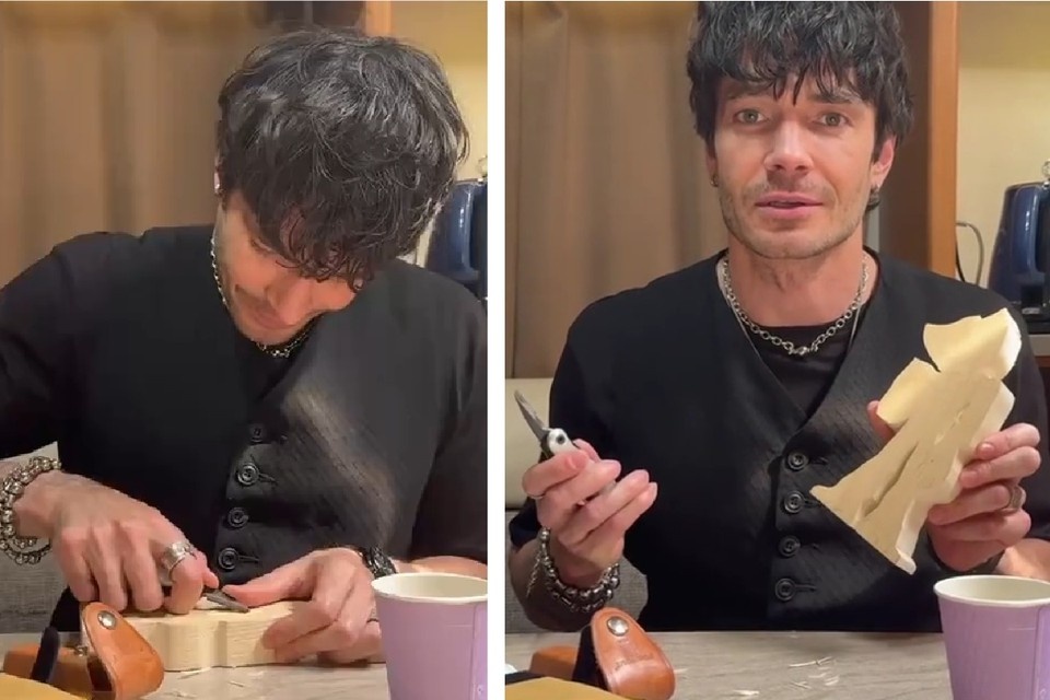    Максим Матвеев мастерит деревянную игрушку. Фото: кадр с видео t.me/matveev_wlove