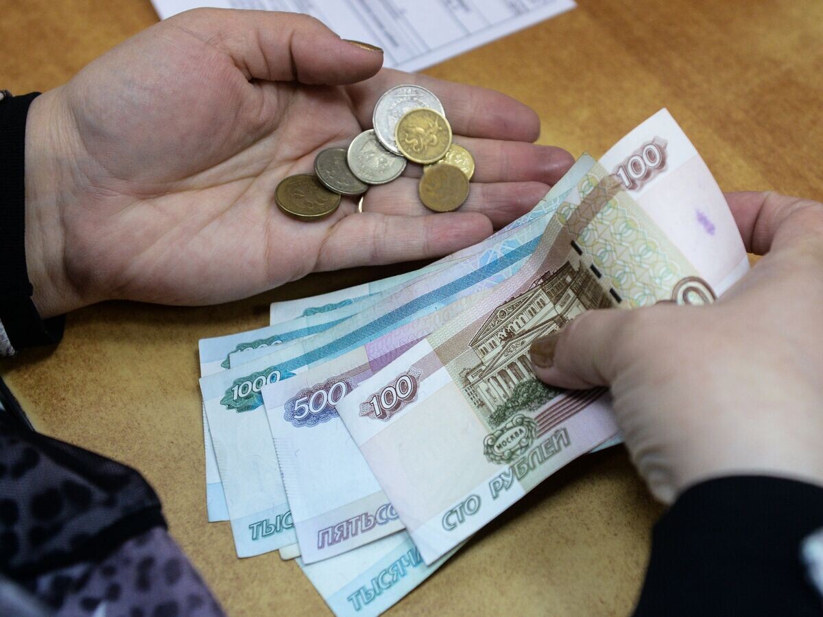    Выплата пенсии в одном из отделений "Почты России"© РИА Новости / Александр Кряжев