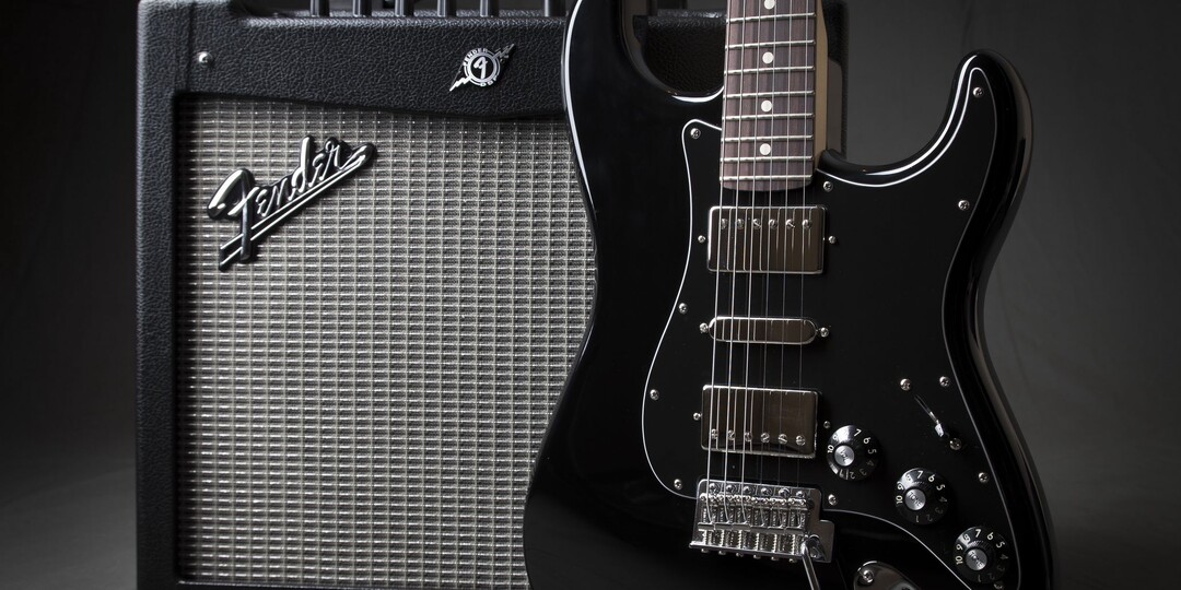 Как выбрать первую электрогитару и что для нее нужно?