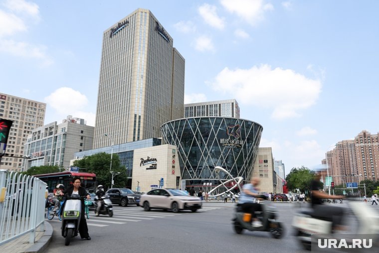 За последние десятилетия Тяньцзинь заметно вырос и стал одним из важных промышленных и торговых центров Китая
Фото:Роман Наумов © URA.RU