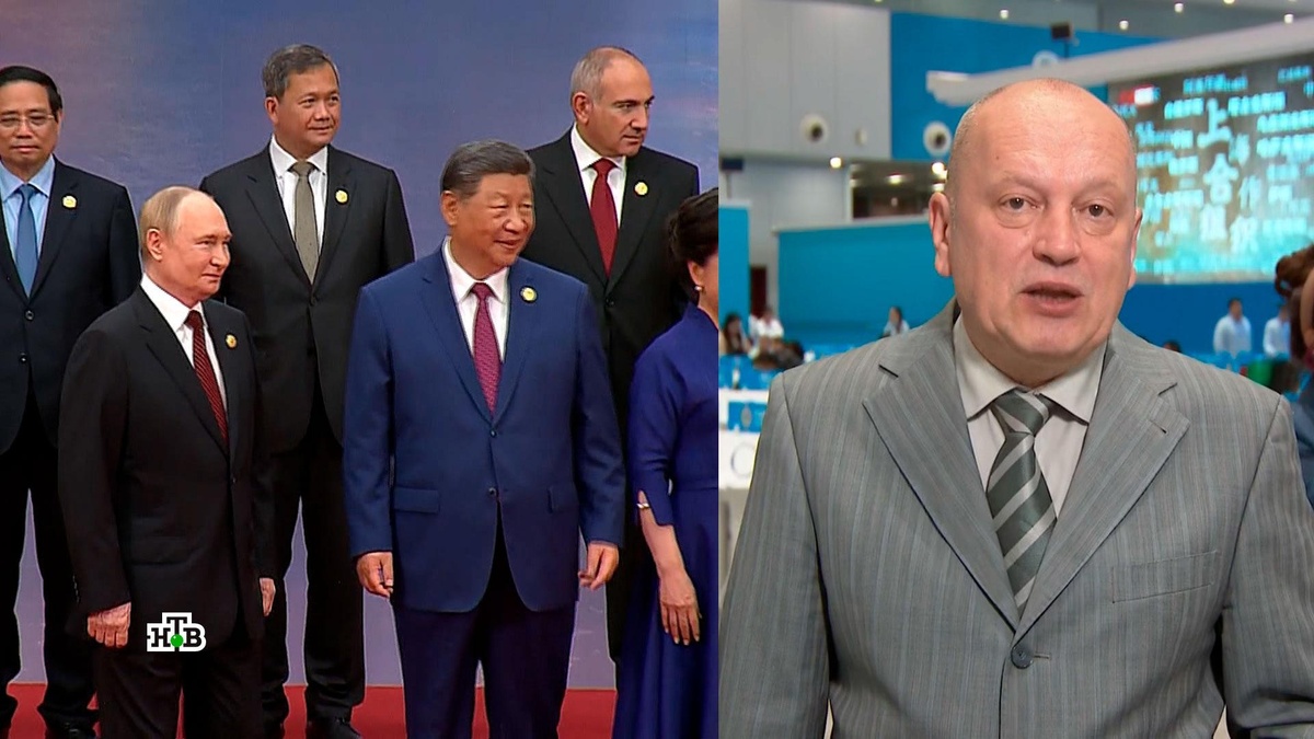    Высшая степень доверия: на фото участников саммита ШОС Путин и Си стояли рядом